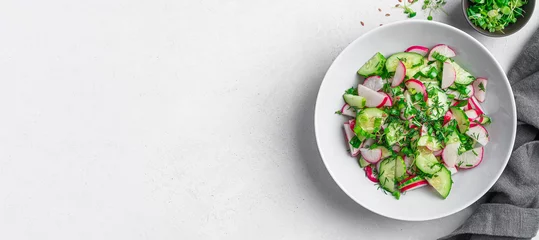  Summer, healthy salad with radishes, micro greens, cucumber and flax seeds. Top view, horizontal. © Helga1