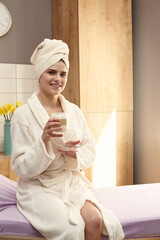 client drinking coffee in the spa