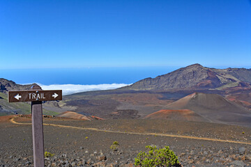 Hiking trail sign atop of the sacred Haleakala Crater summit on the island of Maui, Hawaii a U..S. National Park © Ryan Tishken