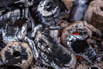 Close up shot of burning wood and charcoal used for barbeque