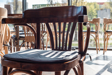 Wooden chair in a cafe close up