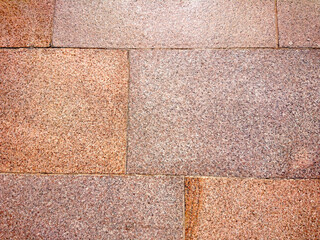 Paving red pink gray paving slabs on city street background texture