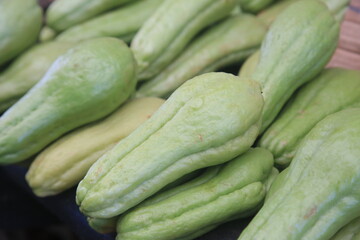 salvador, bahia, brazil - april 30, 2022: chayote for sale on display at a stall at the Sao Joaquim...