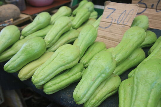 salvador, bahia, brazil - april 30, 2022: chayote for sale on display at a stall at the Sao Joaquim fair in the city of Salvador.