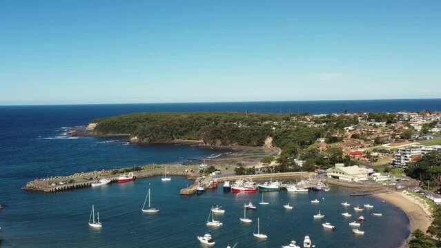 Ulladulla waterfront harbour on Sapphire South Coast of Australia &ndash; aerial 4k.
