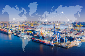 Fototapeta premium Large cargo port. Sea cargo port from bird's eye view. Maritime logistics concept. Process of loading containers onto transport vessel. Empty ferries near coast. International logistics