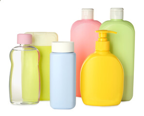 Bottles of baby cosmetic products on white background