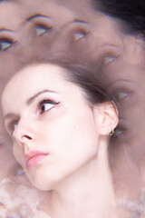 Naklejka premium Art portrait, kaleidoscope. Woman in leopard hoodie