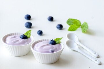 Blueberry Yogurt with Fresh Blueberries and Mint, White Background