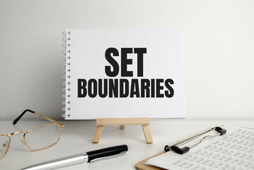 Set boundaries, text words typography written on paper against wooden background