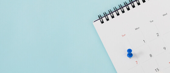 calendar on the table blue. empty copy space for text. concept for busy timeline organize schedule,appointment and meeting reminder. planning for business meeting or travel holiday planning concept. © methaphum