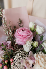 Pink and white ranunculus in a bouquet. Festive bouquet