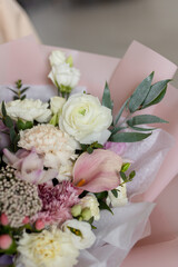 Pink and white ranunculus in a bouquet. Festive bouquet
