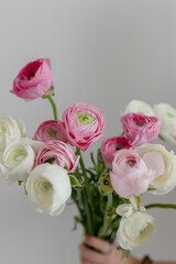 Beautiful Bouquet of pink ranunculus ( ranunculus ) on a white background