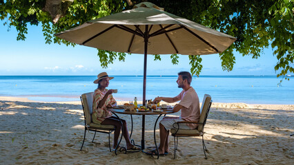 breakfast on the beach of a luxury resort during vacation. luxury holiday with breakfast on the...