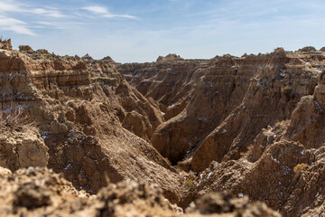 A canyon of sedimentary rocks make up the landscape at Badlands National Park in South Dakota