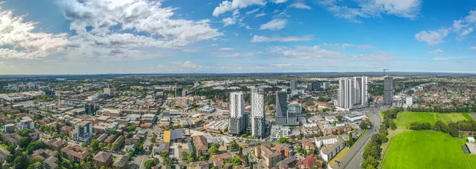  Panoramic aerial drone view of Liverpool in Greater Western Sydney, New South Wales, Australia looking east showing the high rise residential apartments © Steve