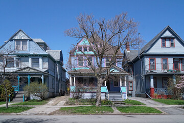 Residential street with traditional three story clapboard houses
