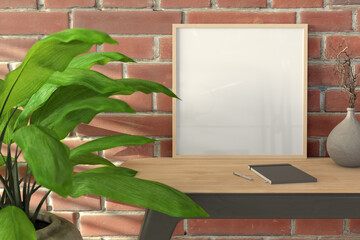 Square wooden frame mock up on wooden desk and red brick wall.