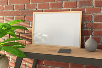 Horizontal wooden frame mock up on wooden desk and red brick wall.