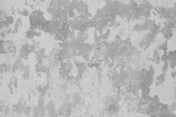 Black and white background of dilapidated and uneven wall painted with whitening. Building wall...