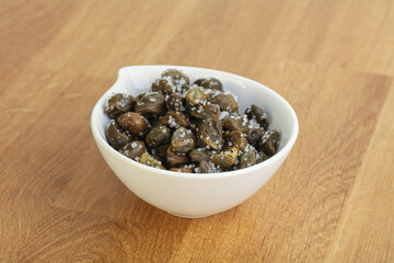 Salted marinated capers snack appetiser