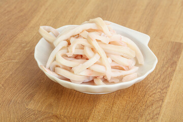Marinated squid strips in the bowl