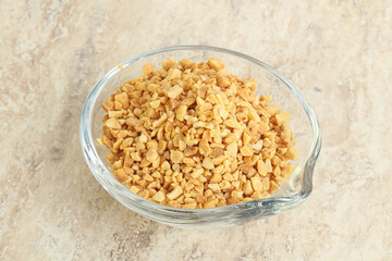 Crunched roasted peanut in the bowl