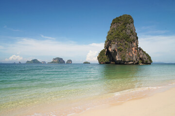 Plakat Landscape Traveller on Railay Phranang Beach white sand and blue sea with limestone in Railay Ao nang Krabi Thailand - sunny day summer 