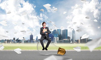 young businessman with a book