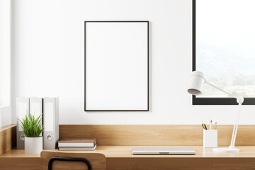 Light office room interior with desk and laptop, window. Mockup frame