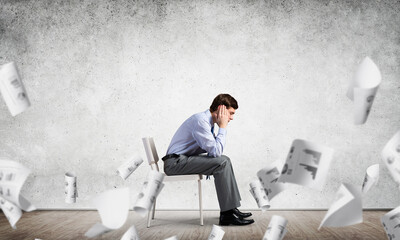 Businessman sitting on an office chair