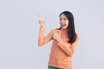 Asian Woman Pointing to Blank Space