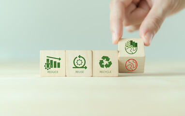 Reused, reduce and recycle concept. Limit global warming and climate change. Nurturing environmental awareness. Flipping wooden cubes from global warming to enviromental responsibility and protection. - obrazy, fototapety, plakaty