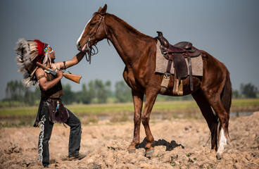 Obraz premium Portrait of a Native American Indian horse riding who used to live in Mexico and America.