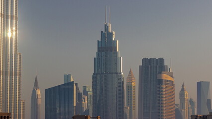 Row of the tall buildings around Sheikh Zayed Road and DIFC district aerial timelapse in Dubai