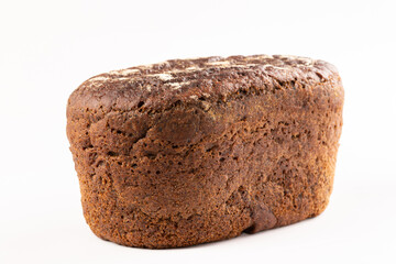 Fresh black bread on a white background.