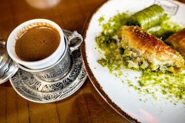 Baklava, a popular Turkish pastry with pistachio, in Gaziantep, Turkey.  With Turkish coffee on the side