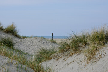 Tranquil picturesque landscape peaceful holiday vacation sandy dunes beach scenery at Dutch North...