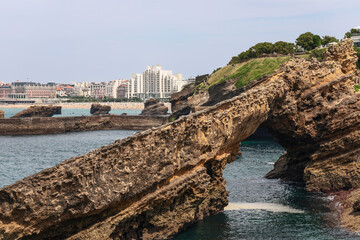 Fototapeta na wymiar Picturesque unique rock formations protruding above water near sea observation decks of Biarritz city. Biarritz, French Basque Country
