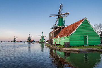 Fototapeta na wymiar Historical buildings and windmills in Zaanse Schans, Netherlands