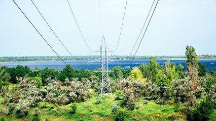 Panoramic view tower hight voltage on solar panel station backgtound. Solar sun electricity power in nature. Clean energy, green technology environmental conservation concept.