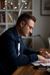 Successful freelancer working on computer while staying at home 