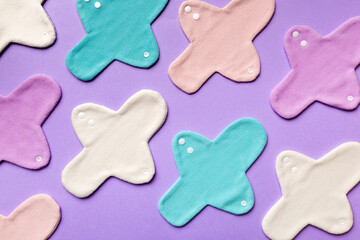 Eco-friendly reusable fabric women's pads. set of colorful bright reusable menstrual pads. zero waste woman periods concept top view with copy space