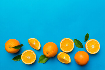 fresh Fruit orange slices on colored background. Top view. Copy Space. creative summer concept. Half of citrus in minimal flat lay with copy space