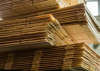 Woodworking industry. Natural veneer in bundles for further use in furniture manufacturing.