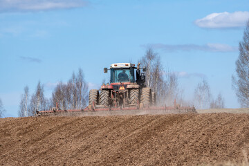 Fototapeta premium tractor in a field from Latvia