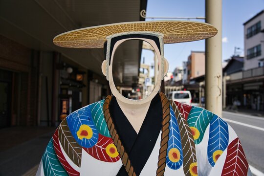 Gifu, Japan - April 22, 2022 : A stand in cardboard cutout on a street of Takayama city
