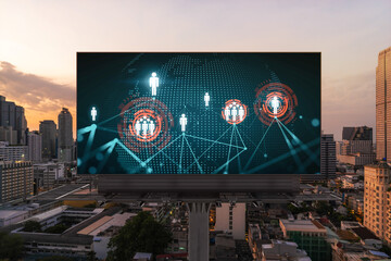 World planet Earth map hologram of social media icons over sunset panoramic cityscape of Bangkok, Southeast Asia. The concept of people connections.