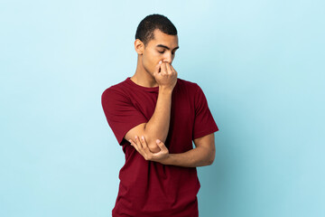 African American man over isolated background having doubts